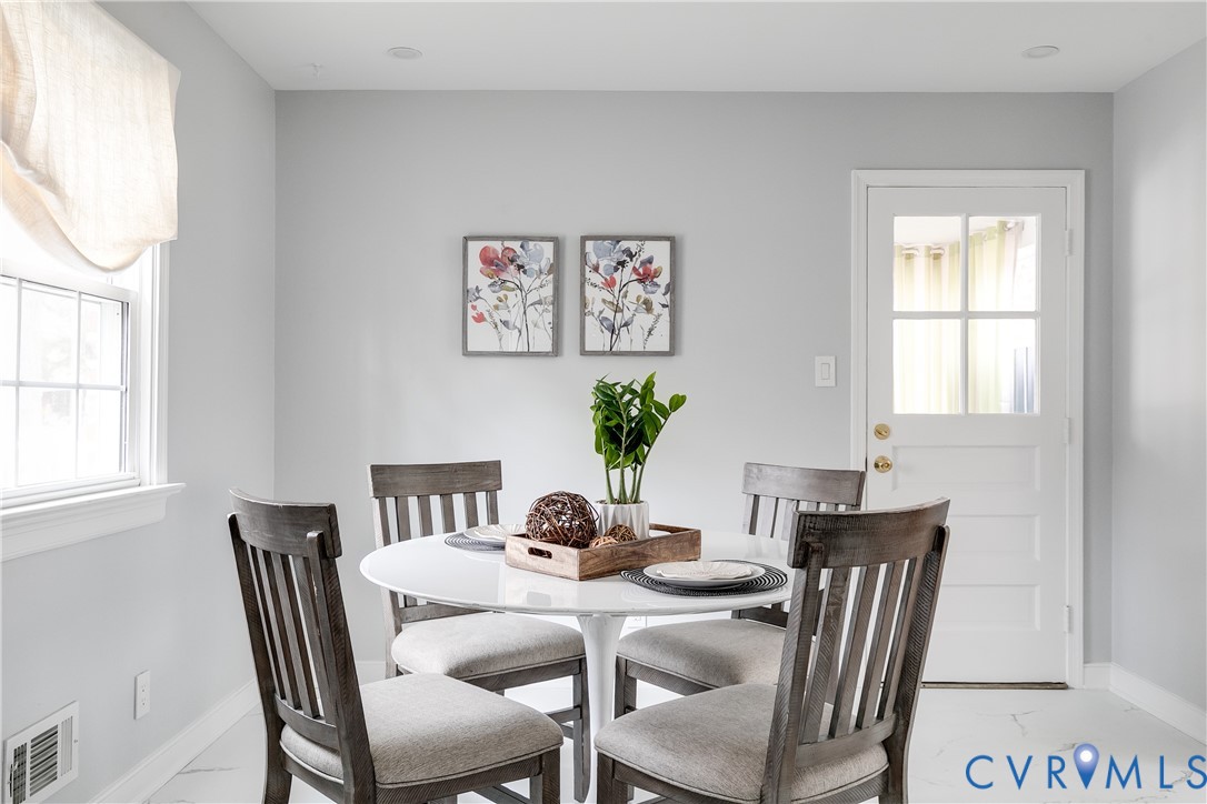 900 Ryder Road North Chesterfield, VA 23235 - Photo 14 of 45 a view of a dining room with furniture window and outside view