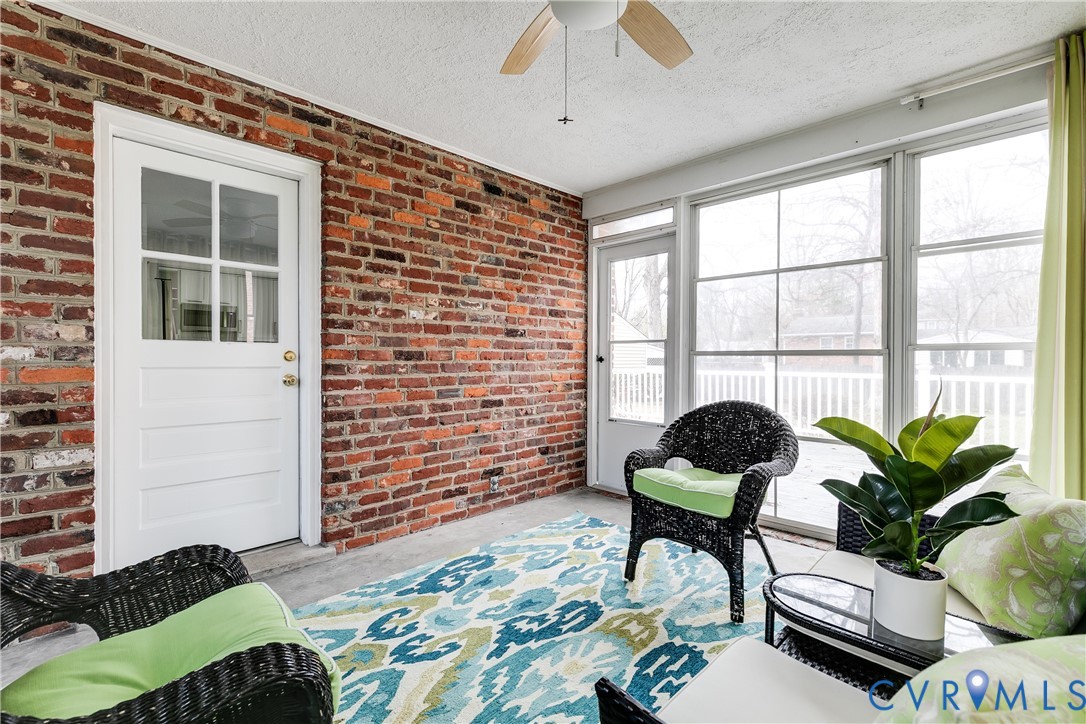 900 Ryder Road North Chesterfield, VA 23235 - Photo 17 of 45 a living room filled with furniture and a potted plant
