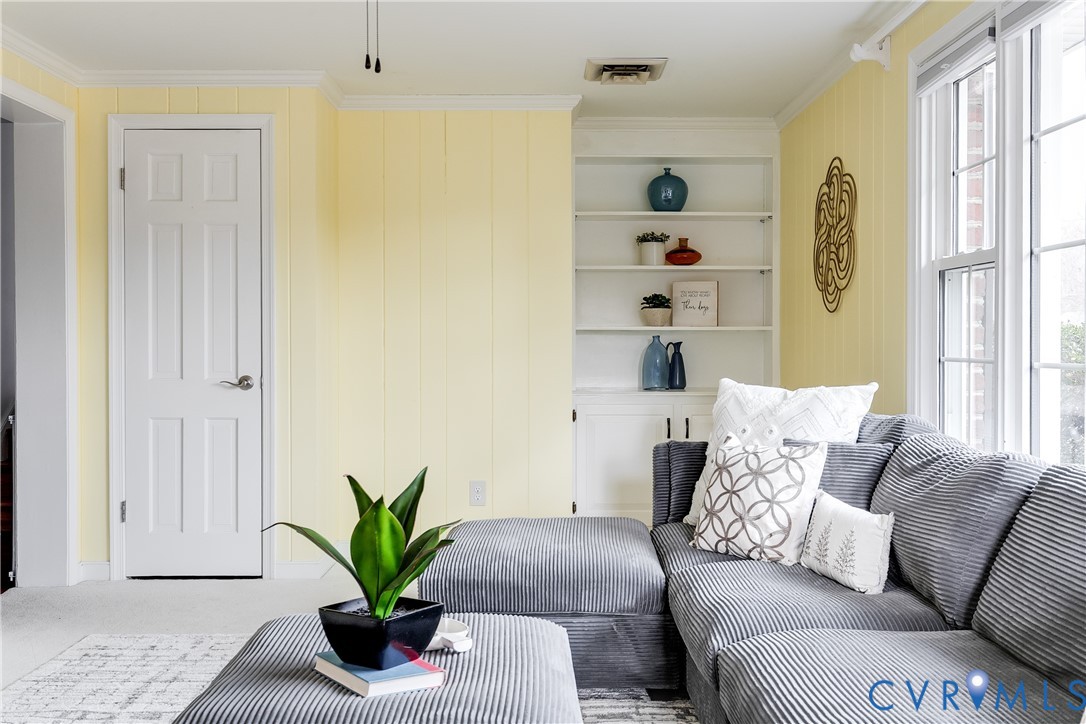 900 Ryder Road North Chesterfield, VA 23235 - Photo 20 of 45 a living room with furniture flowerpot and wooden floor