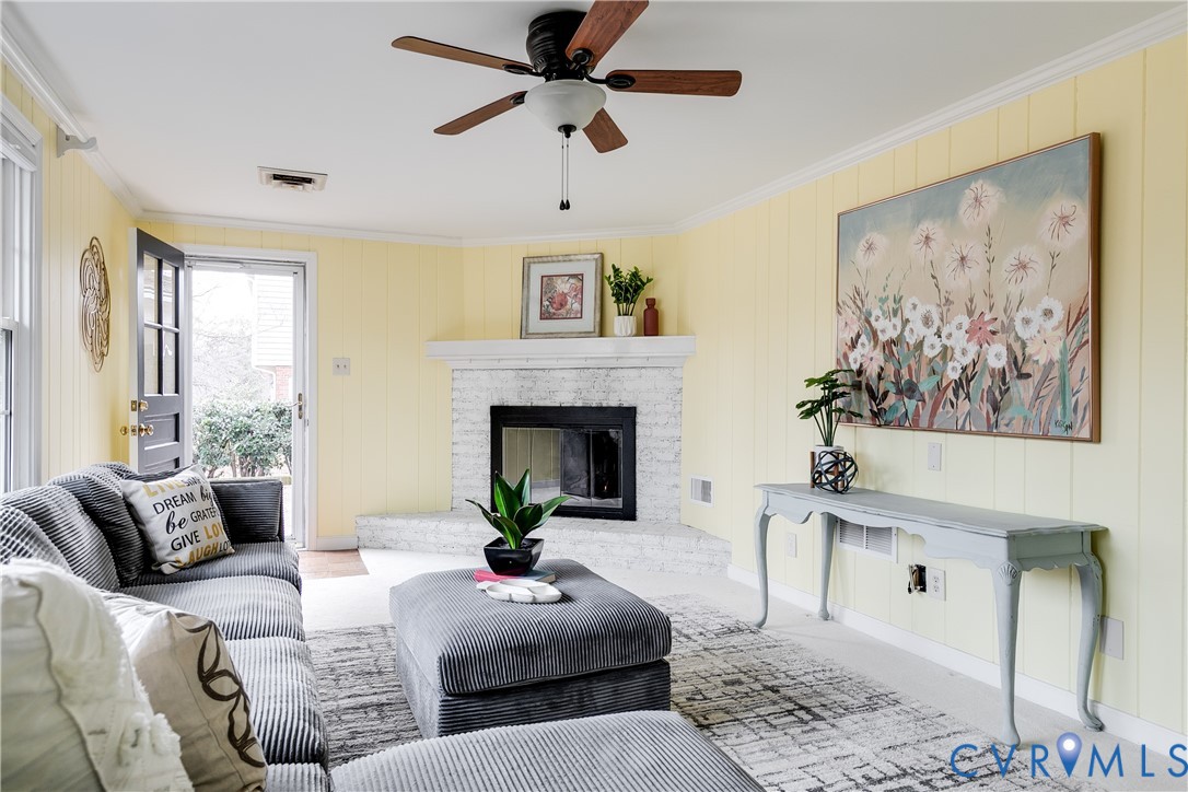 900 Ryder Road North Chesterfield, VA 23235 - Photo 21 of 45 a living room with furniture and a fireplace