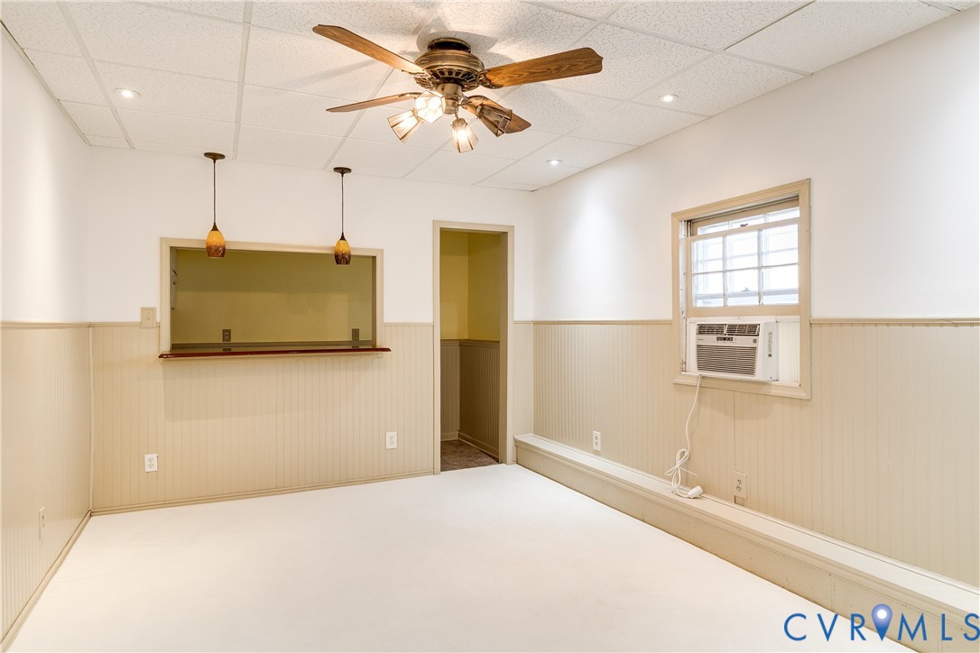 900 Ryder Road North Chesterfield, VA 23235 - Photo 33 of 45 a bedroom with a bed and a chandelier