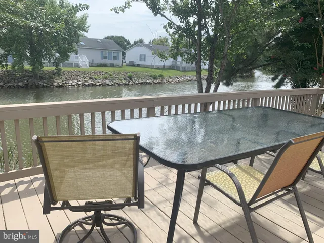 a view of a lake from a balcony