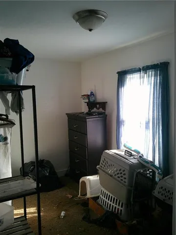 a bathroom with a toilet and a sink