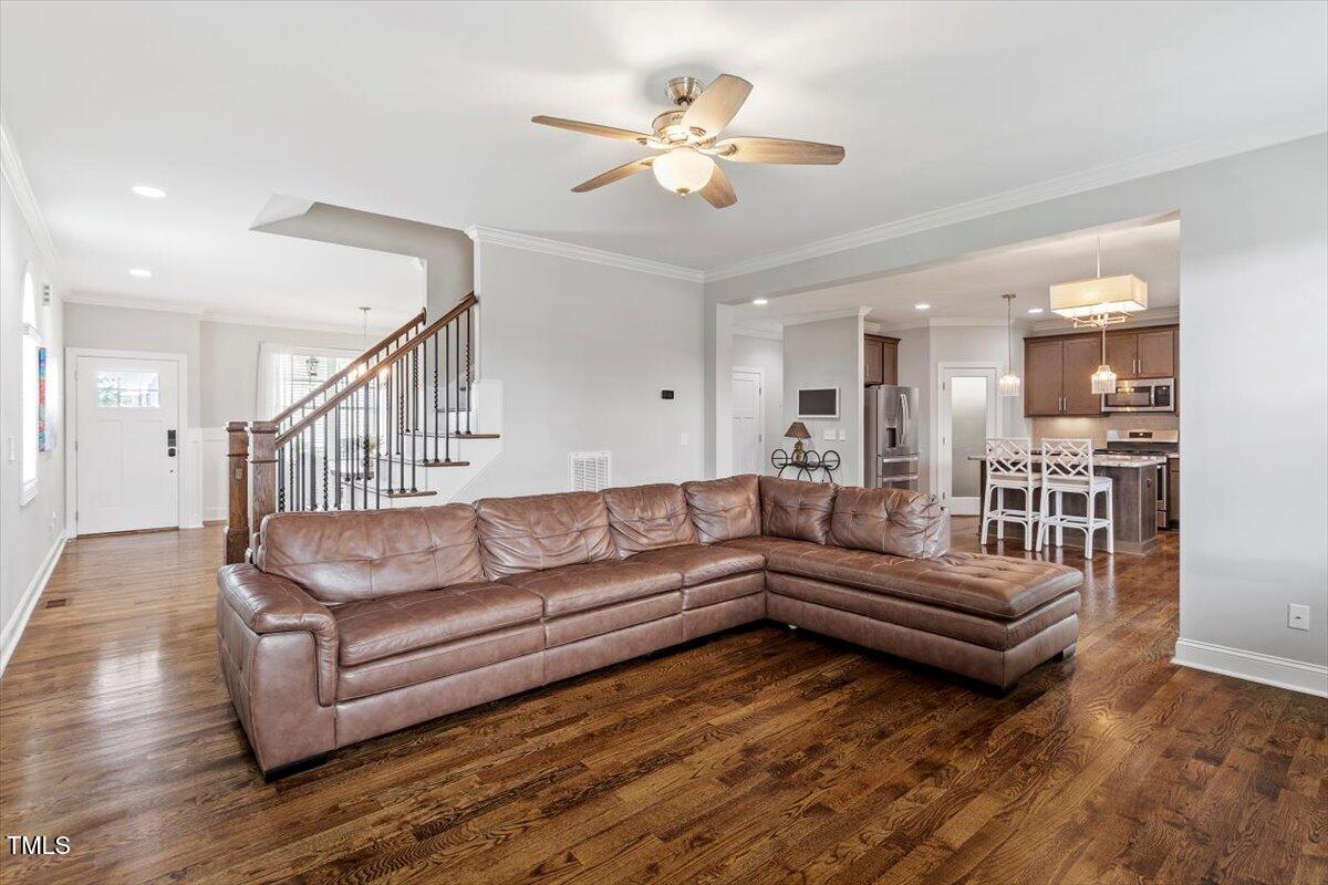 357 Marshcroft Way Rolesville, NC 27571 - Photo 10 of 41 a living room with furniture and wooden floor