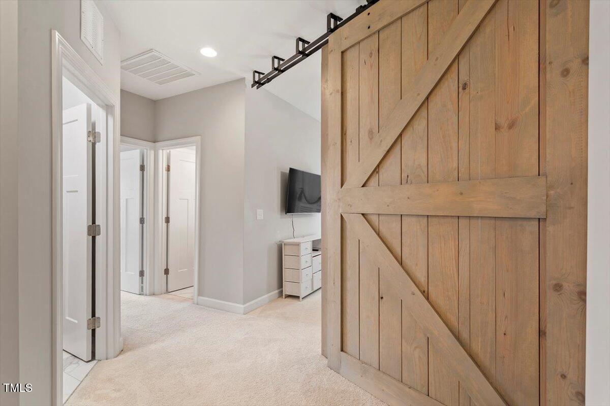 357 Marshcroft Way Rolesville, NC 27571 - Photo 23 of 41 a view of hallway with stairs