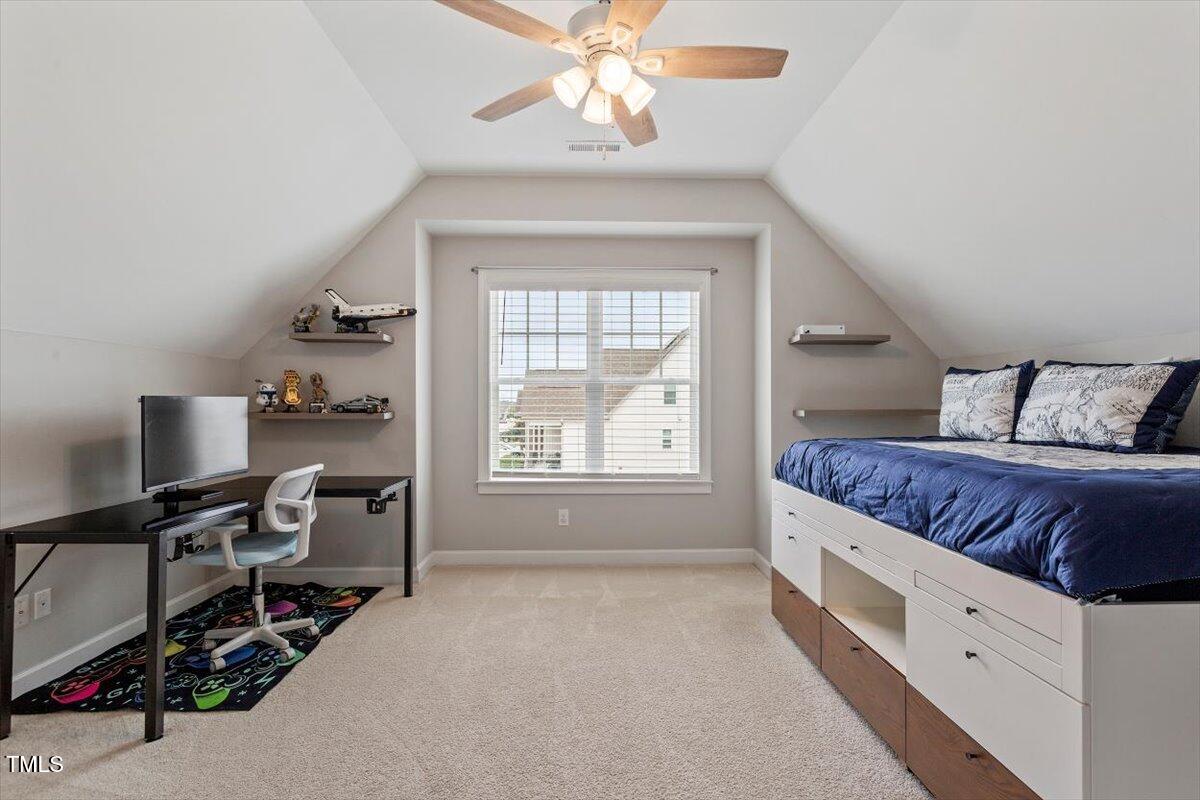 357 Marshcroft Way Rolesville, NC 27571 - Photo 26 of 41 a bedroom with bed and window