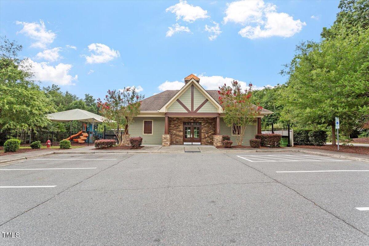 357 Marshcroft Way Rolesville, NC 27571 - Photo 37 of 41 a front view of a house with yard and parking