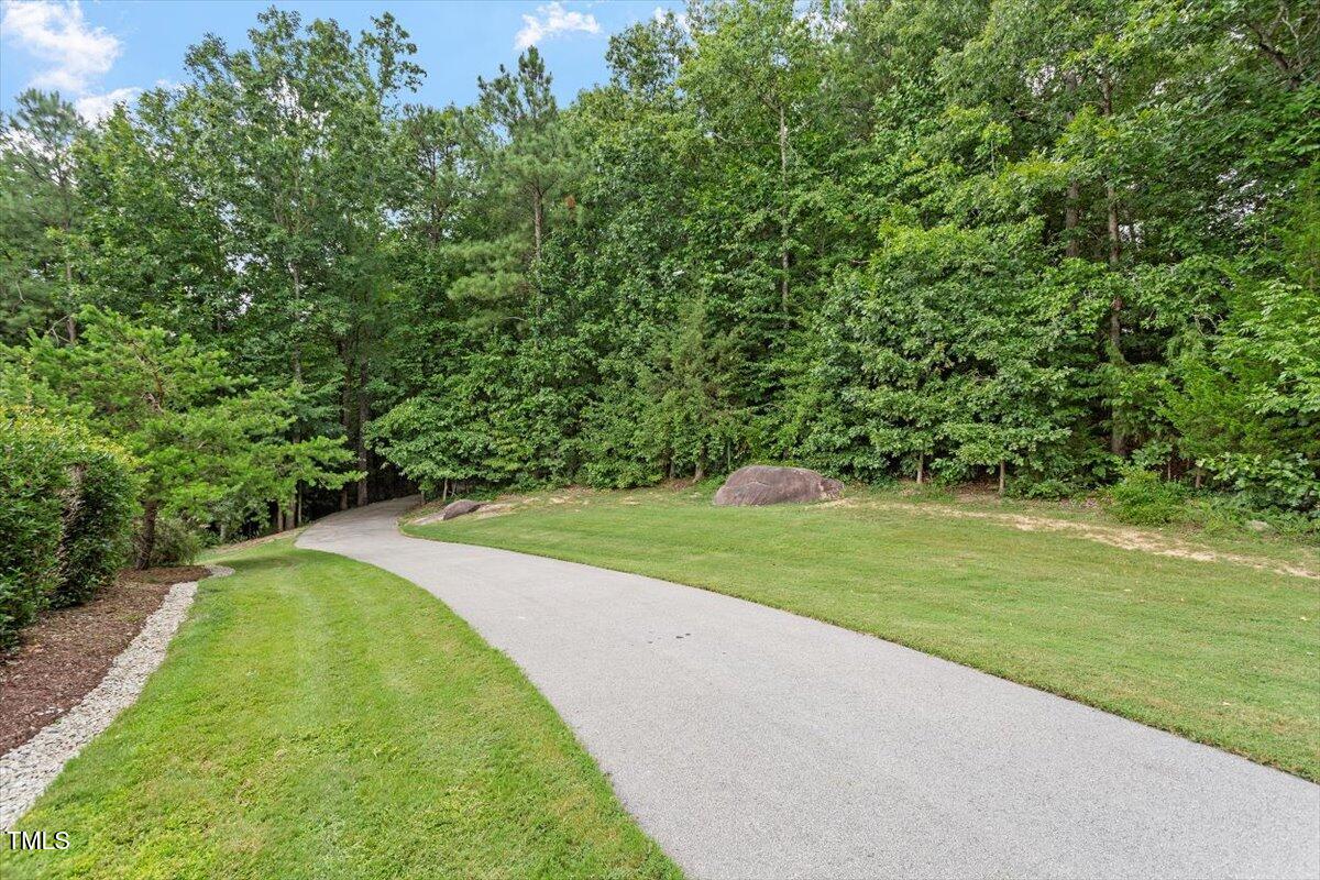 357 Marshcroft Way Rolesville, NC 27571 - Photo 39 of 41 a view of a outdoor space and a swimming pool