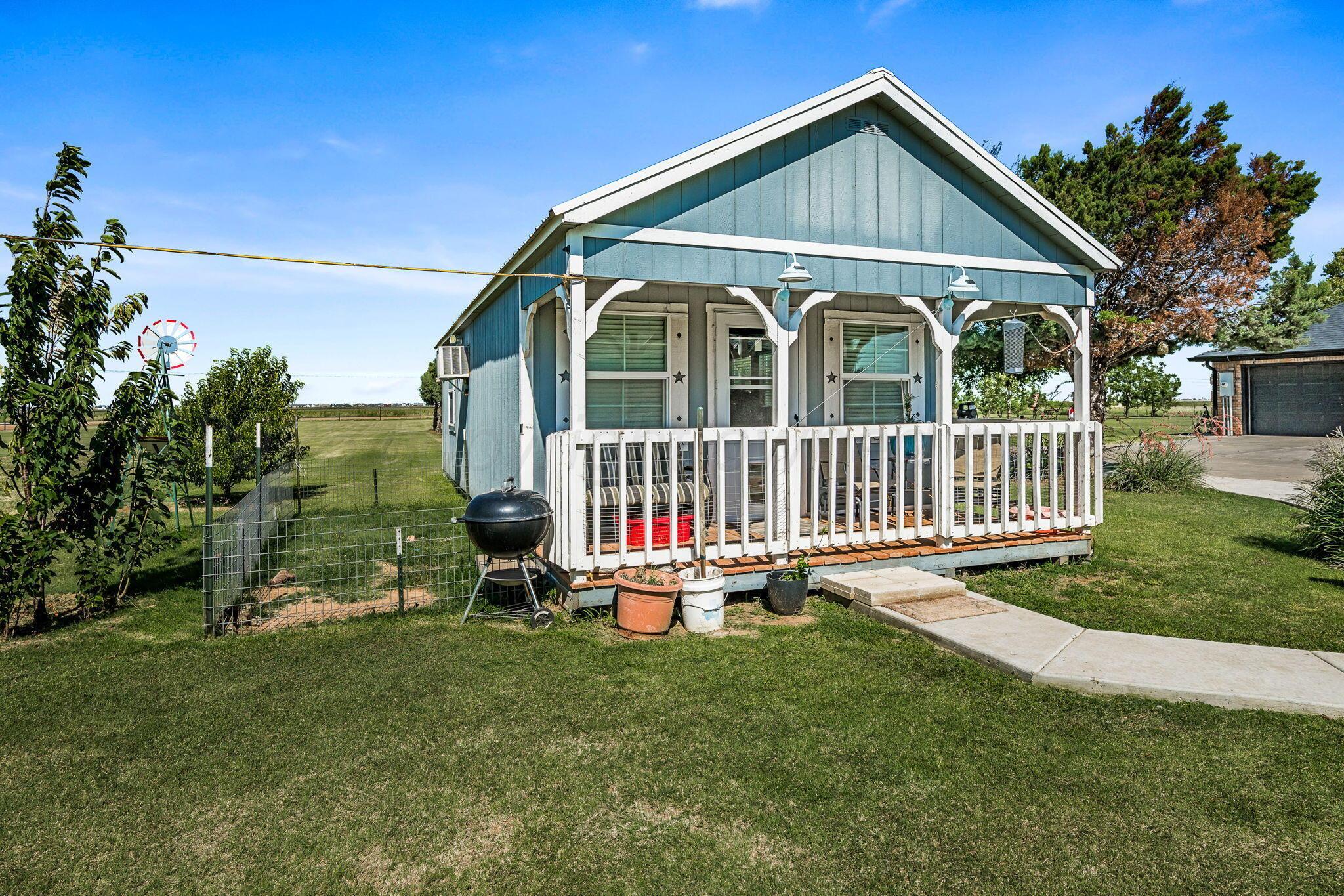 9151 Helium Road Amarillo, TX 79119 - Photo 19 of 49 a view of a house with a yard