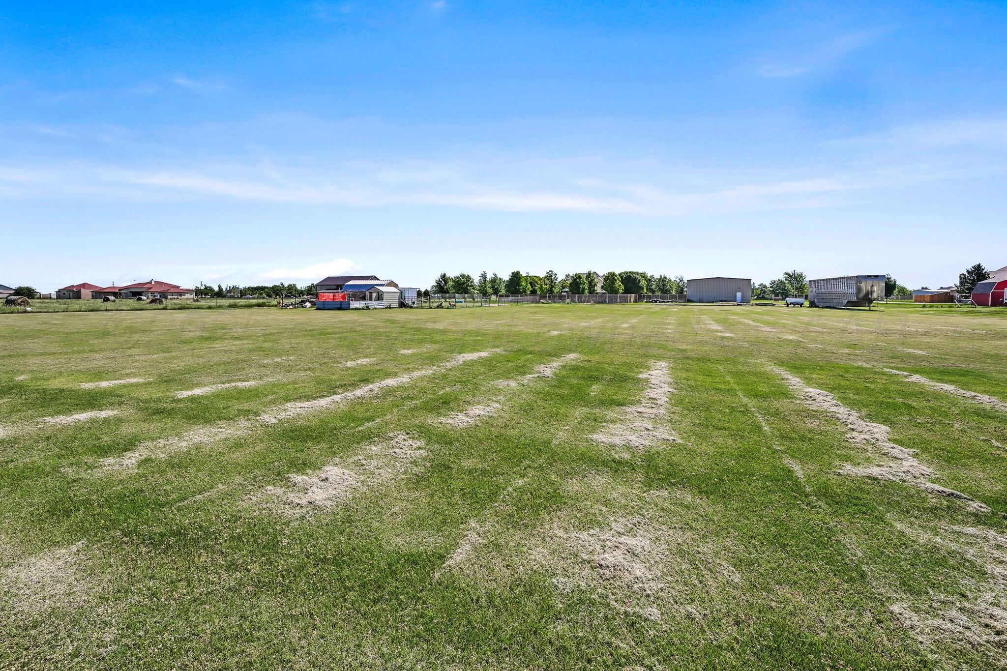 9151 Helium Road Amarillo, TX 79119 - Photo 32 of 49 a view of a field with an ocean