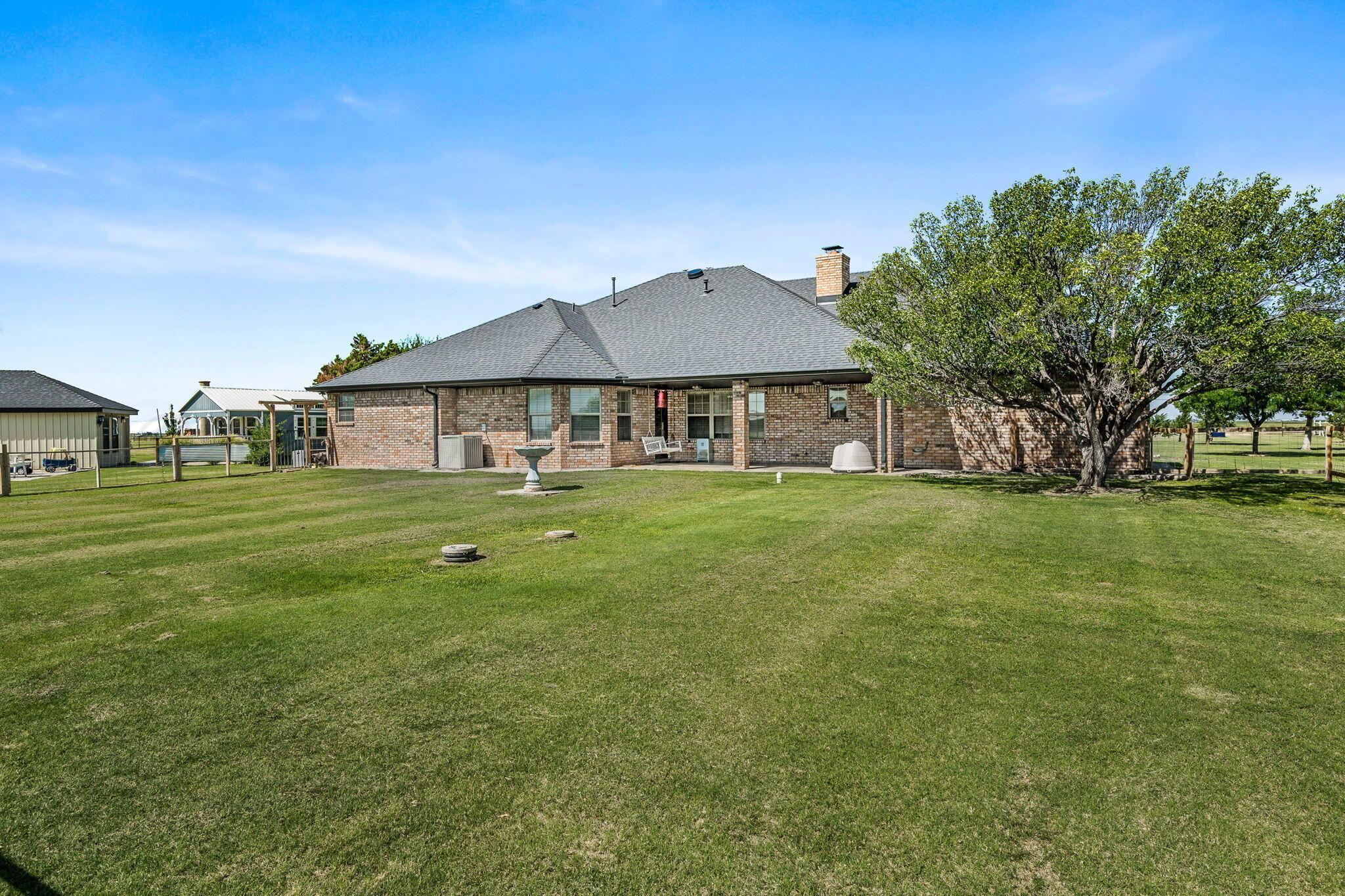 9151 Helium Road Amarillo, TX 79119 - Photo 36 of 49 a house view with a garden space