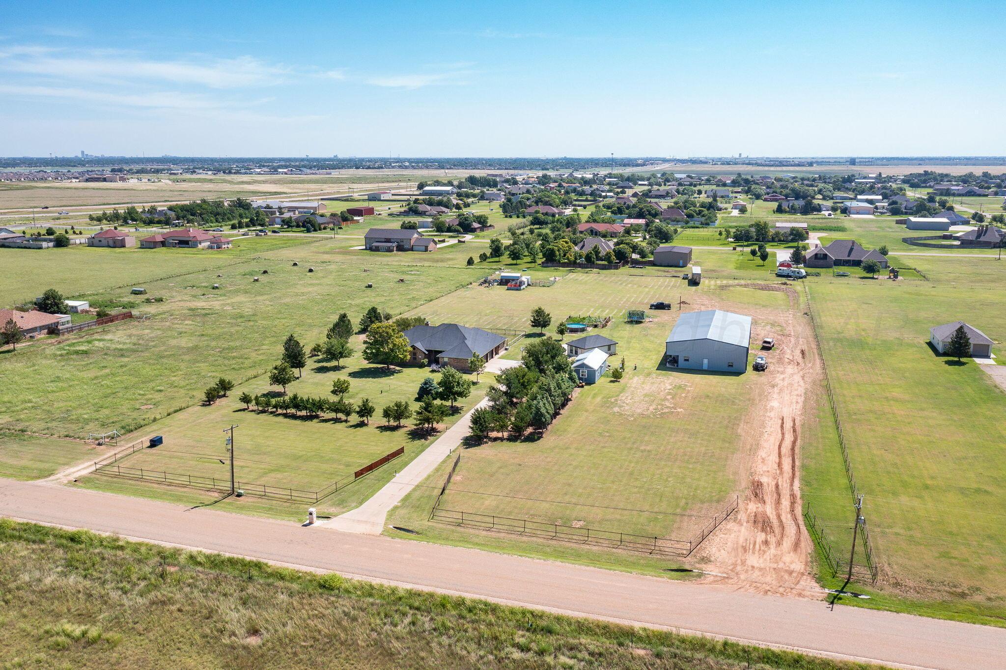 9151 Helium Road Amarillo, TX 79119 - Photo 40 of 49 a view of a swimming pool and lake view