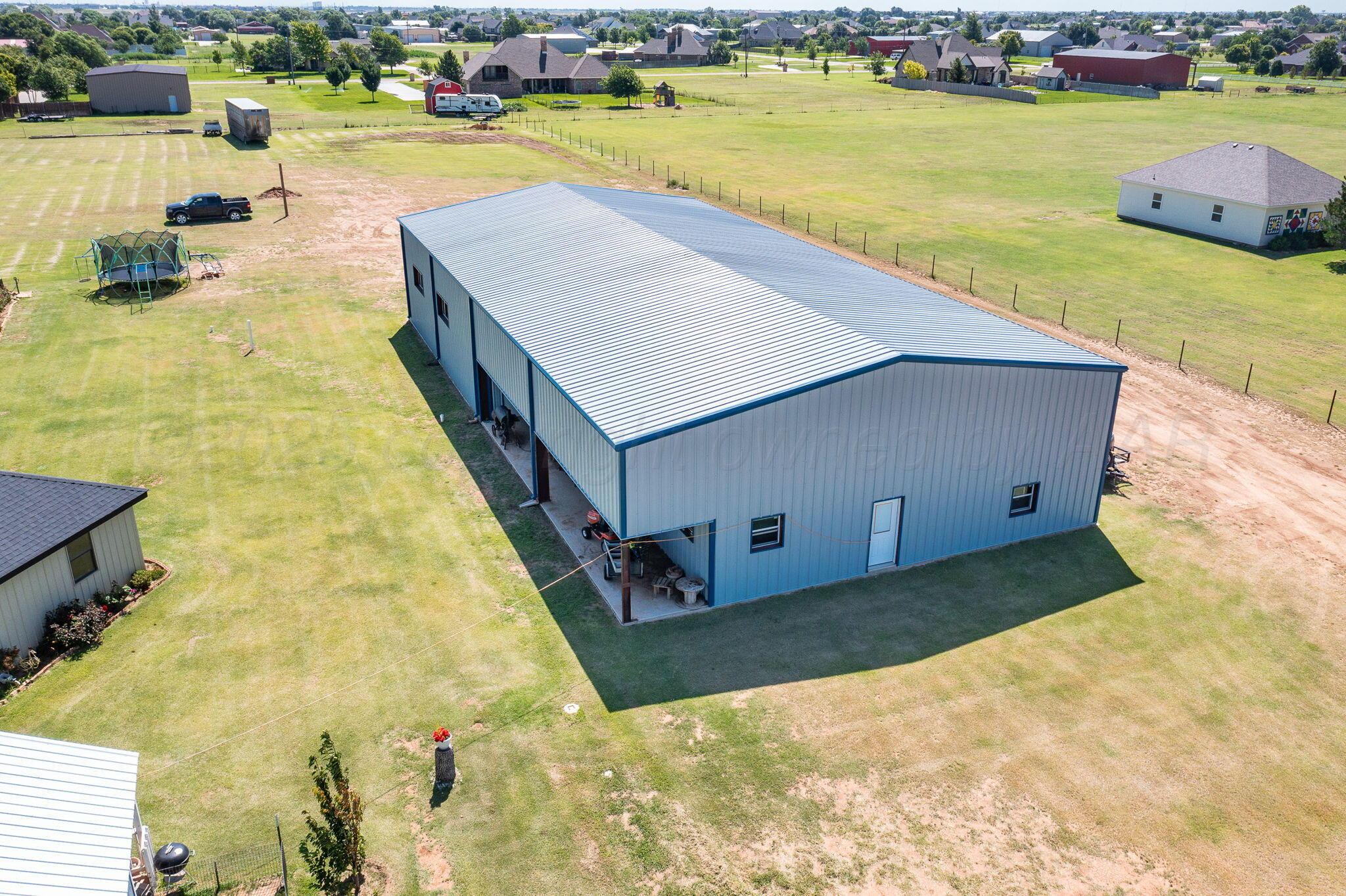 9151 Helium Road Amarillo, TX 79119 - Photo 44 of 49 a view of a swimming pool and an ocean