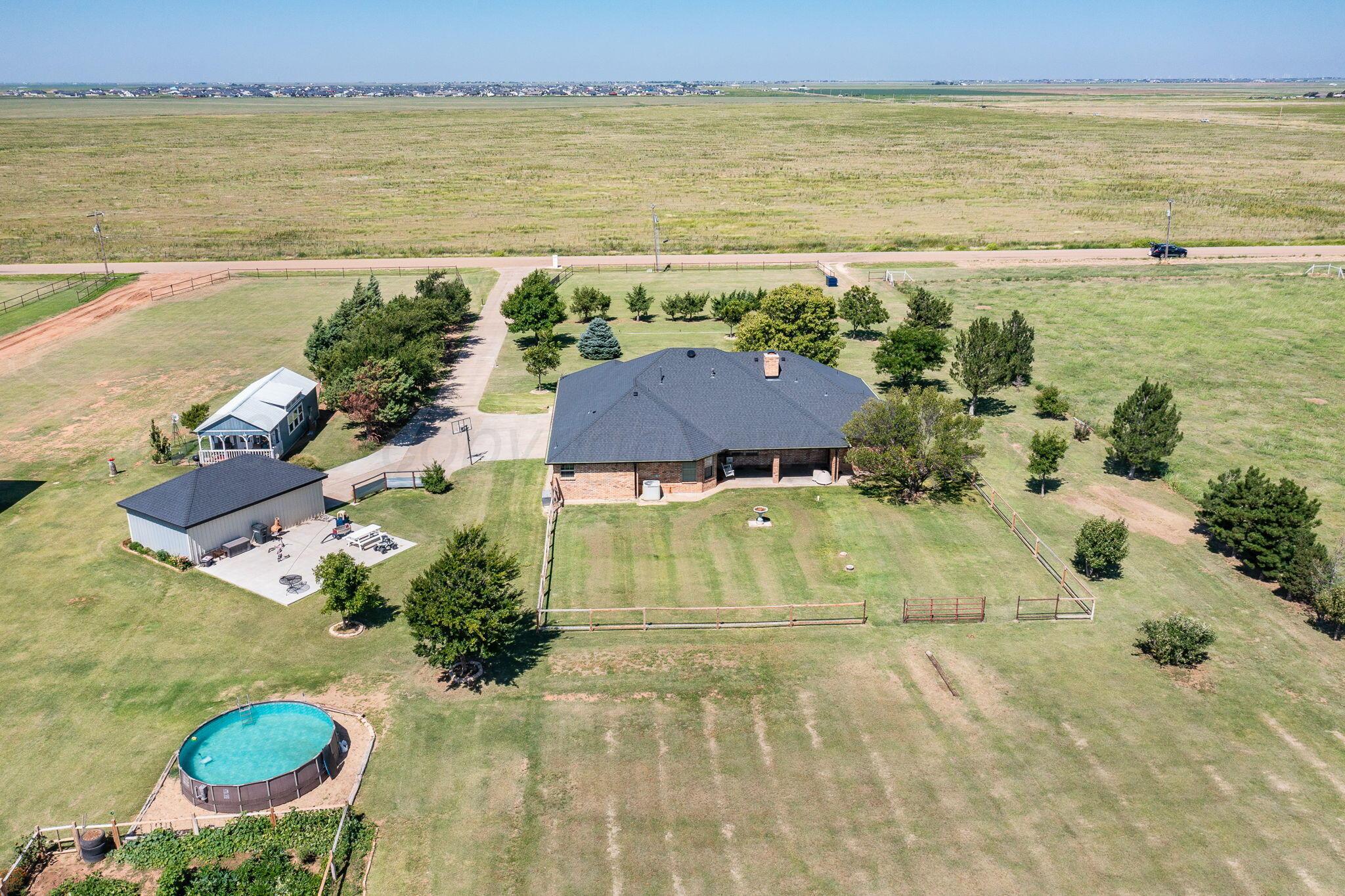 9151 Helium Road Amarillo, TX 79119 - Photo 49 of 49 a view of an ocean with a house