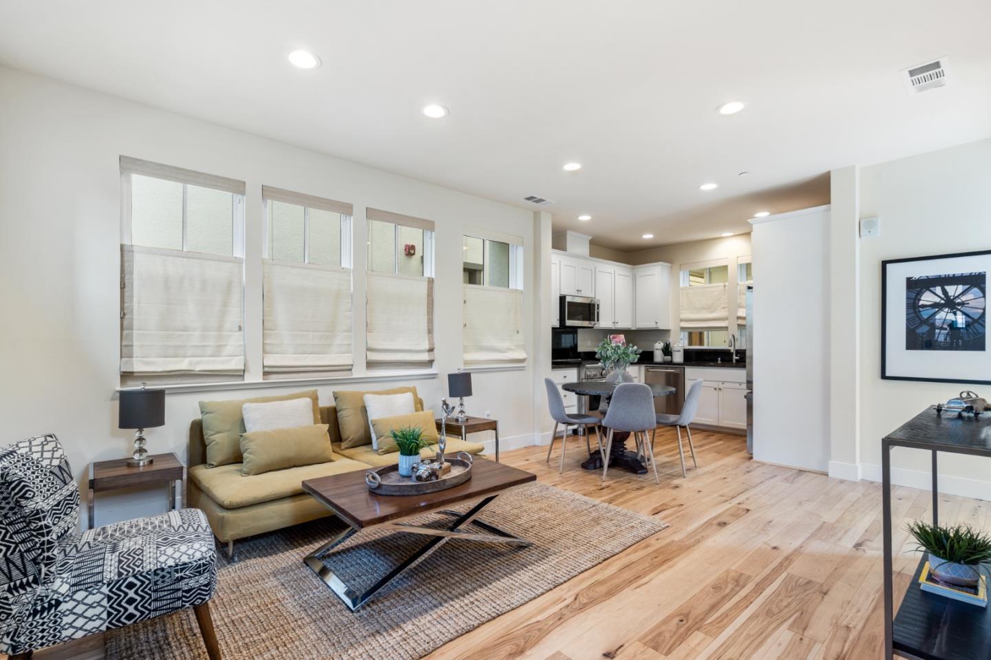 100 Tilton Avenue San Mateo, CA 94401 - Photo 3 of 23 a living room with furniture and kitchen view