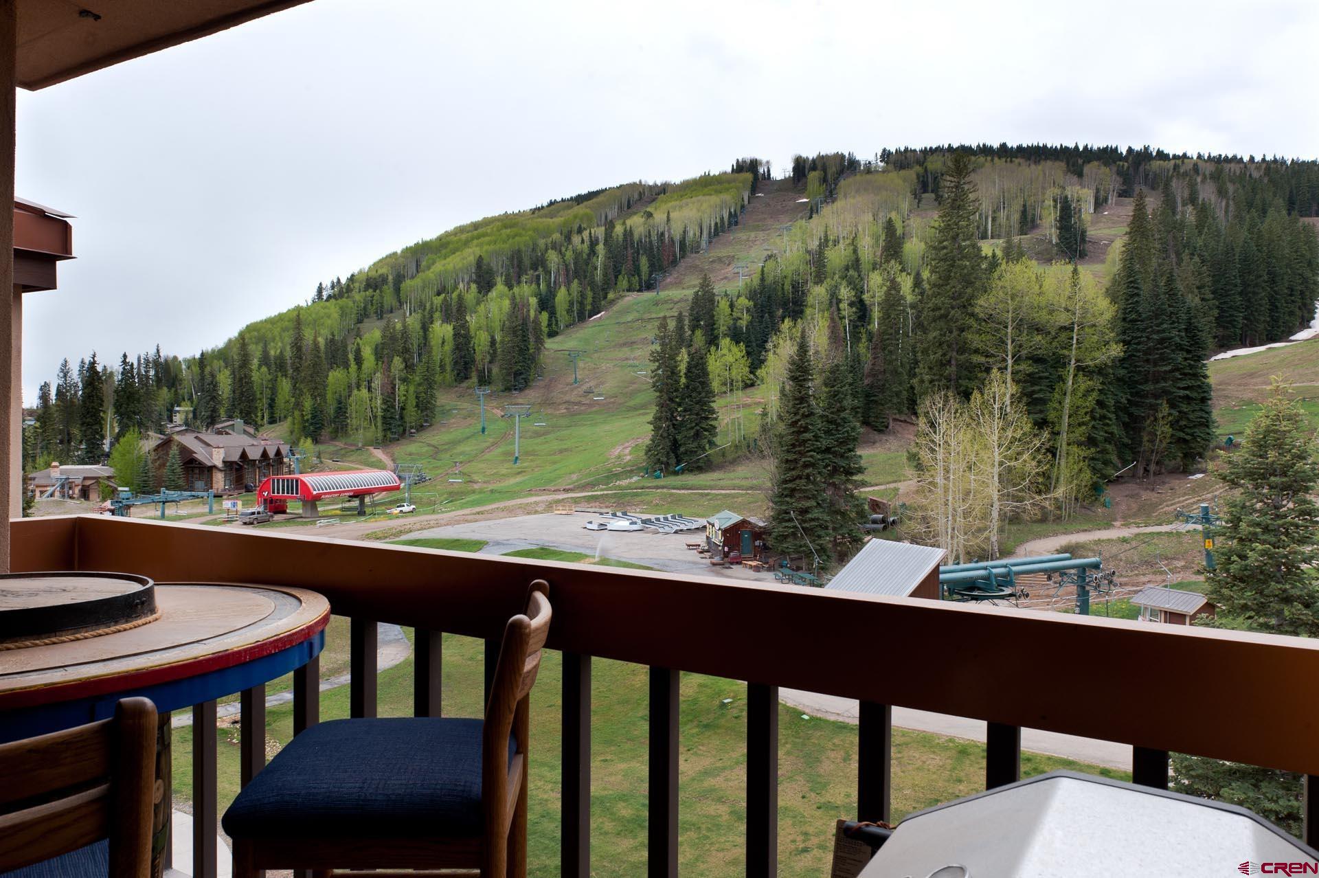 93 Needles Way, Unit 501 Durango, CO 81301 - Photo 5 of 32 a view of a chairs and table in patio