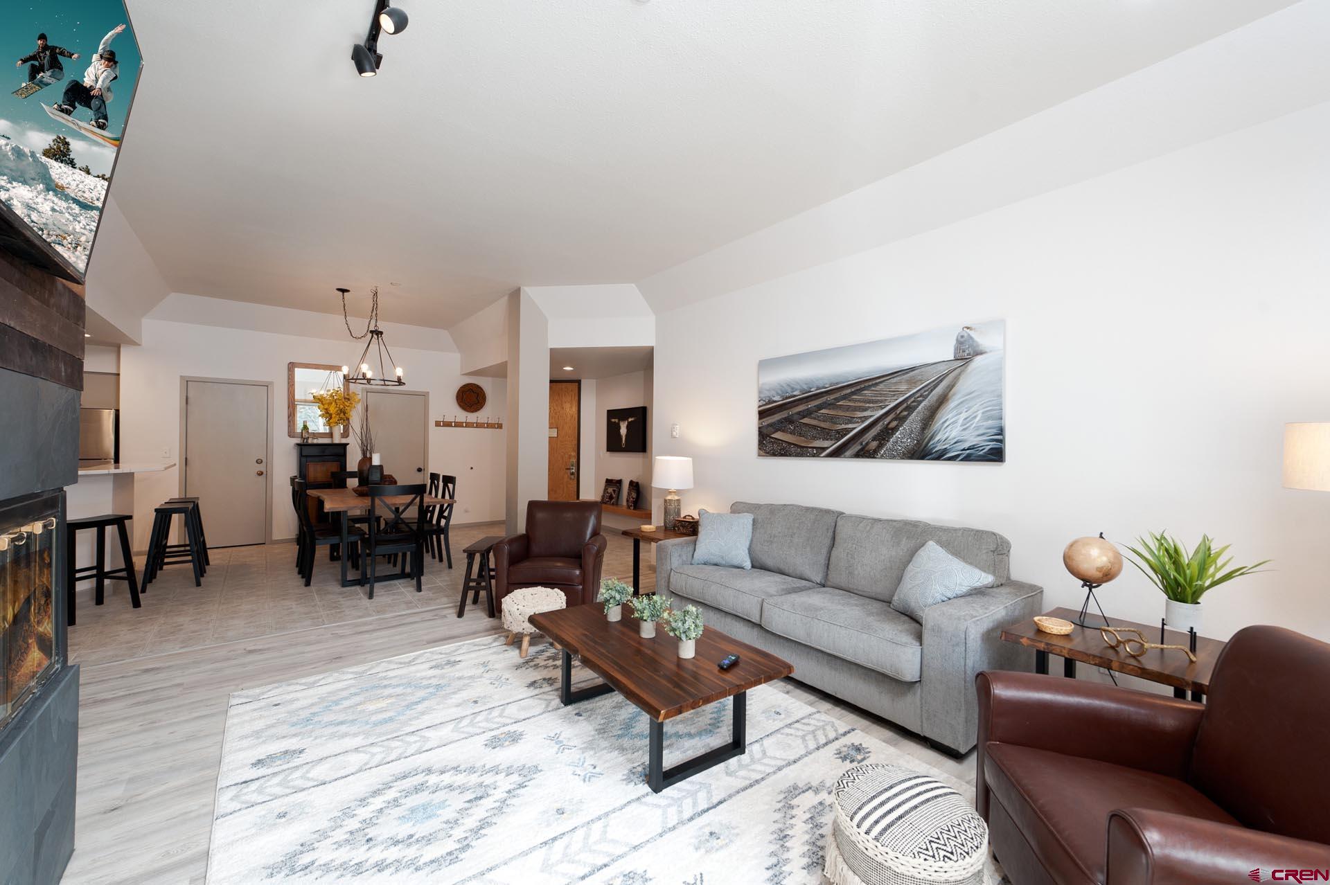93 Needles Way, Unit 501 Durango, CO 81301 - Photo 6 of 32 a living room with furniture and wooden floor
