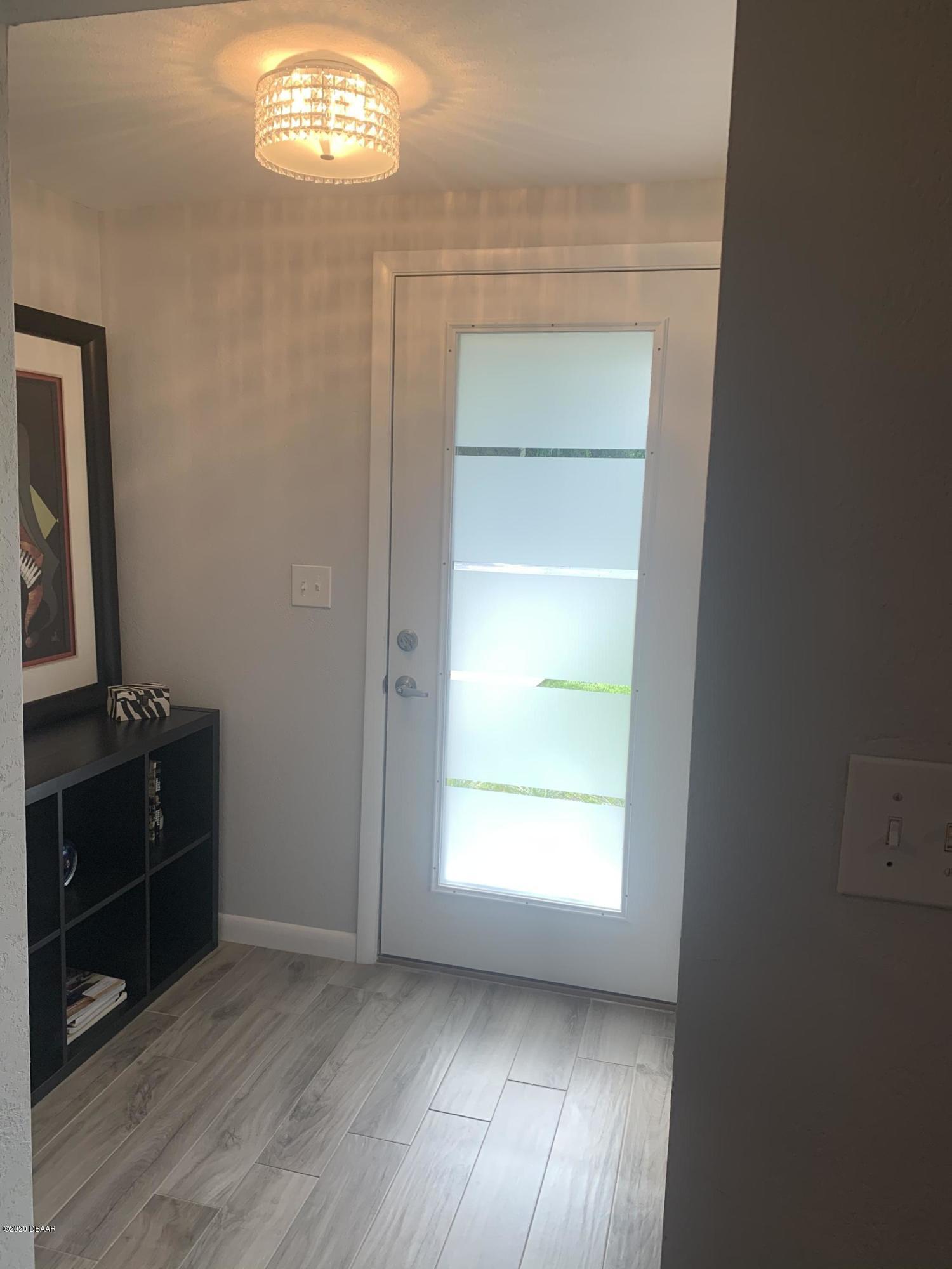 109 Floridana Road DeBary, FL 32713 - Photo 18 of 38 a view of an empty room with a window