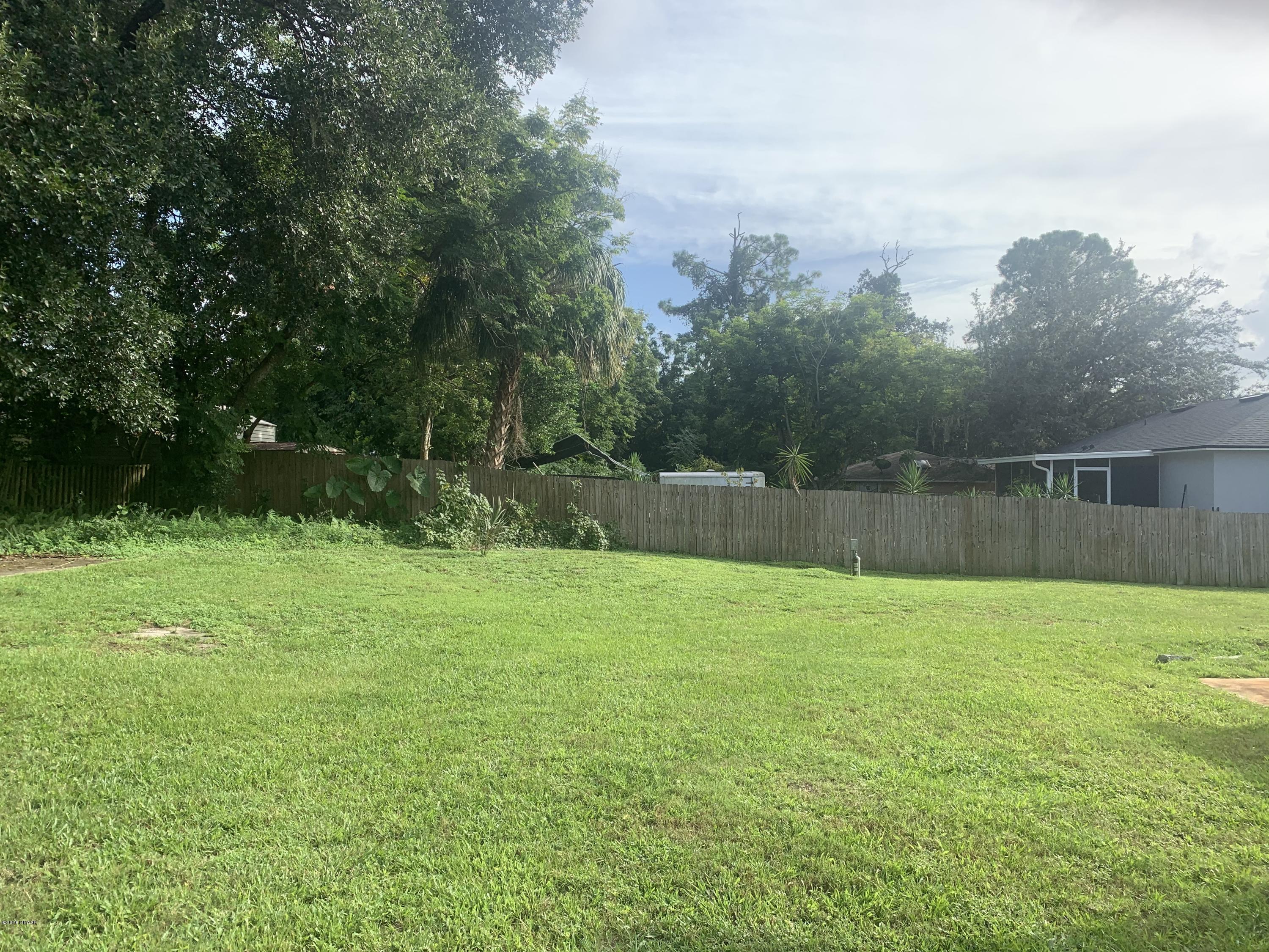 109 Floridana Road DeBary, FL 32713 - Photo 23 of 38 a view of a backyard