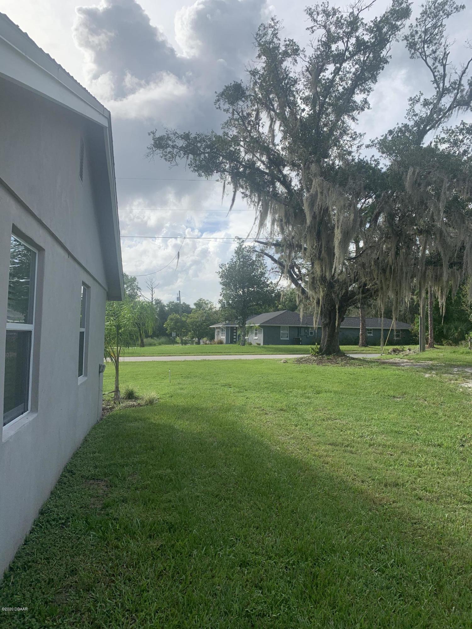 109 Floridana Road DeBary, FL 32713 - Photo 34 of 38 a view of a green field