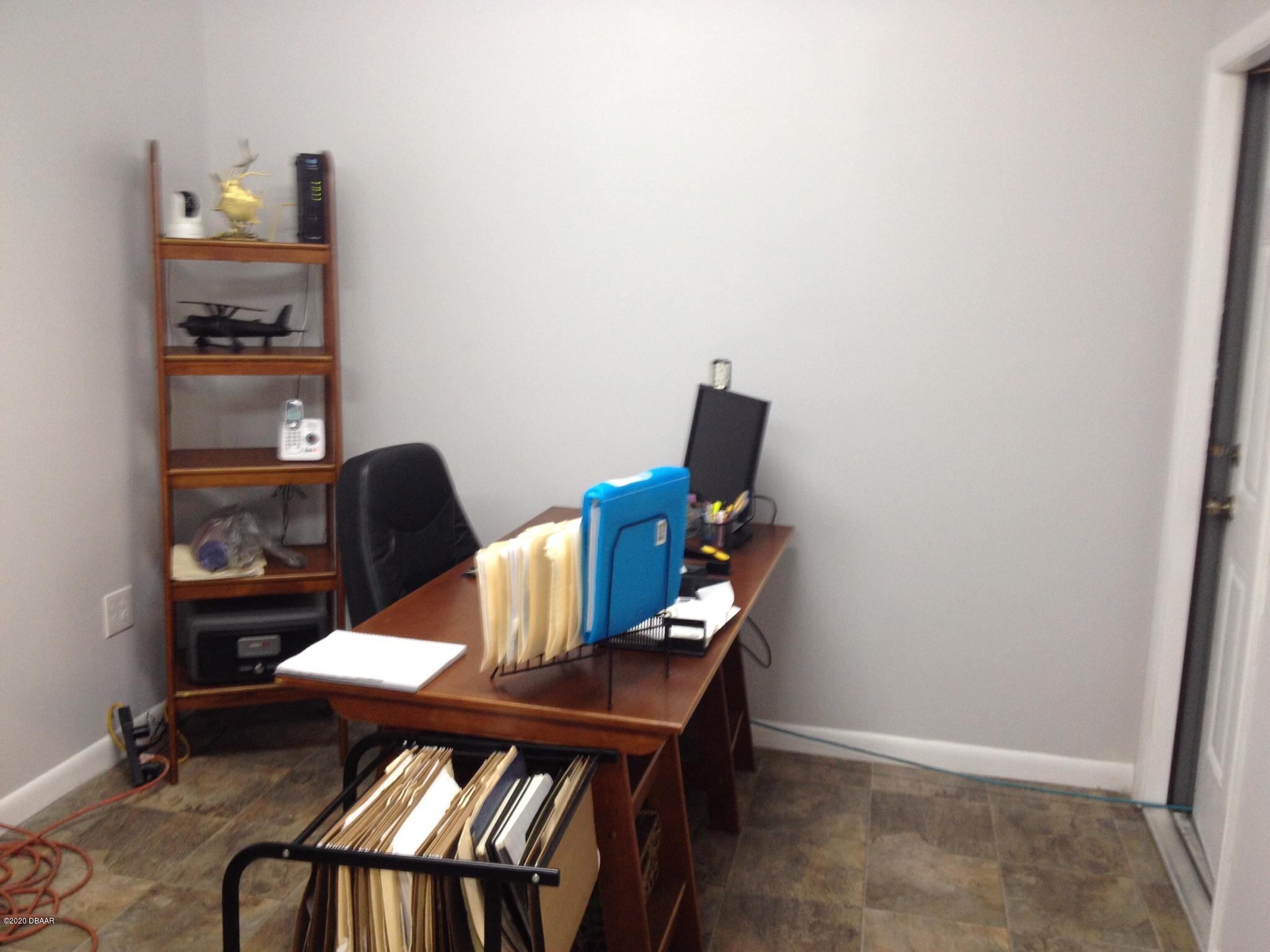 109 Floridana Road DeBary, FL 32713 - Photo 36 of 38 a view of workspace with wooden floor