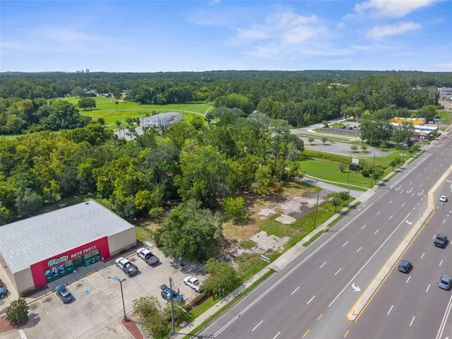 a view of city from balcony with furniture