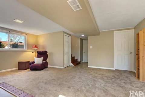 a room with furniture and a window