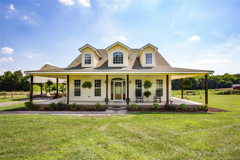 122 Barrier Farms Road Midland, NC 28107 - Photo 1 of 33 a front view of building with yard