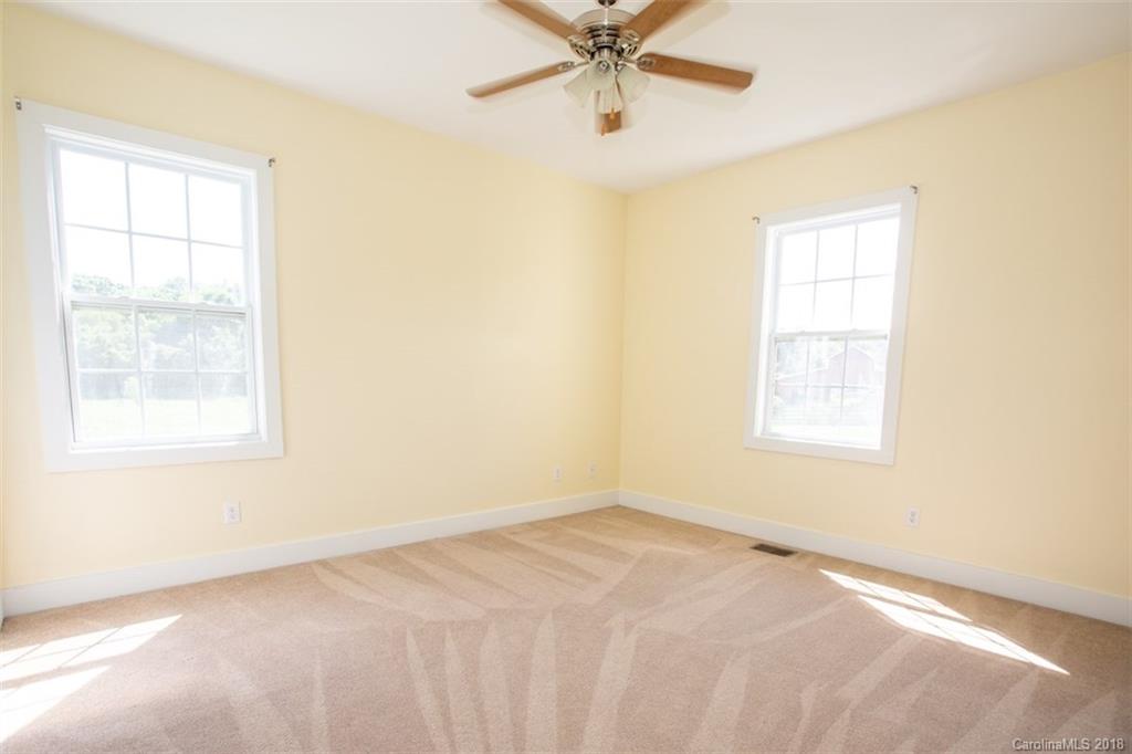 122 Barrier Farms Road Midland, NC 28107 - Photo 15 of 33 an empty room with a window