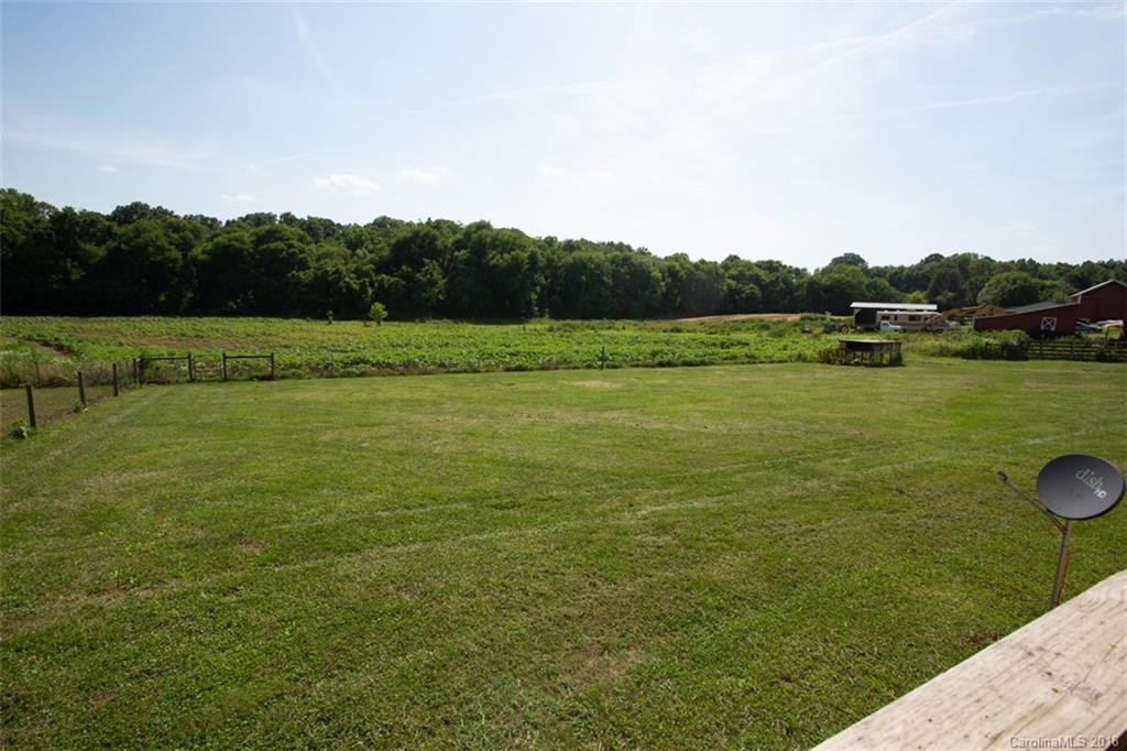 122 Barrier Farms Road Midland, NC 28107 - Photo 29 of 33 a view of a field with an ocean