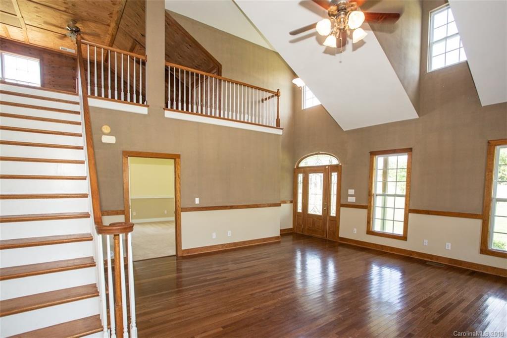 122 Barrier Farms Road Midland, NC 28107 - Photo 4 of 33 a view of an entryway with wooden floor