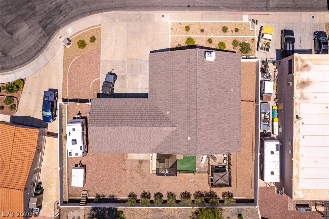 524 Swallow Cove Boulder City, NV 89005 - Photo 3 of 58 An aerial perspective reveals a private desert landscape surrounding the residential property.