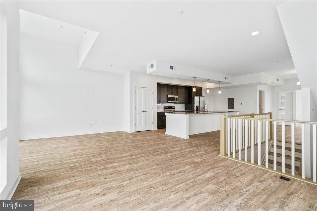 1618 A Blacksmith Way Frederick, MD 21702 - Photo 8 of 45 a view of kitchen with microwave and white cabinets