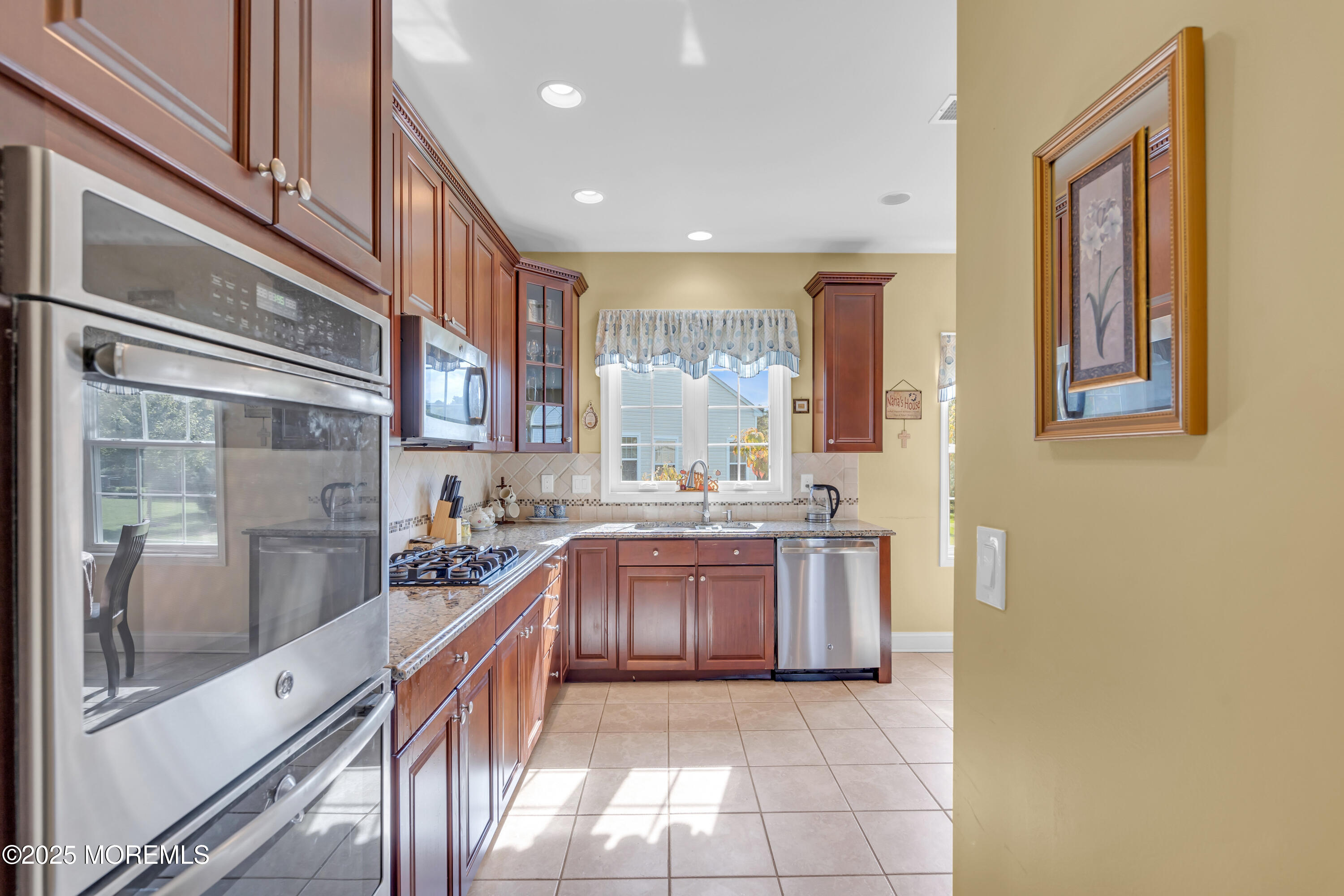 8 Ventnor Court Waretown, NJ 08758 - Photo 18 of 42 a large kitchen with stainless steel appliances granite countertop a stove and a sink