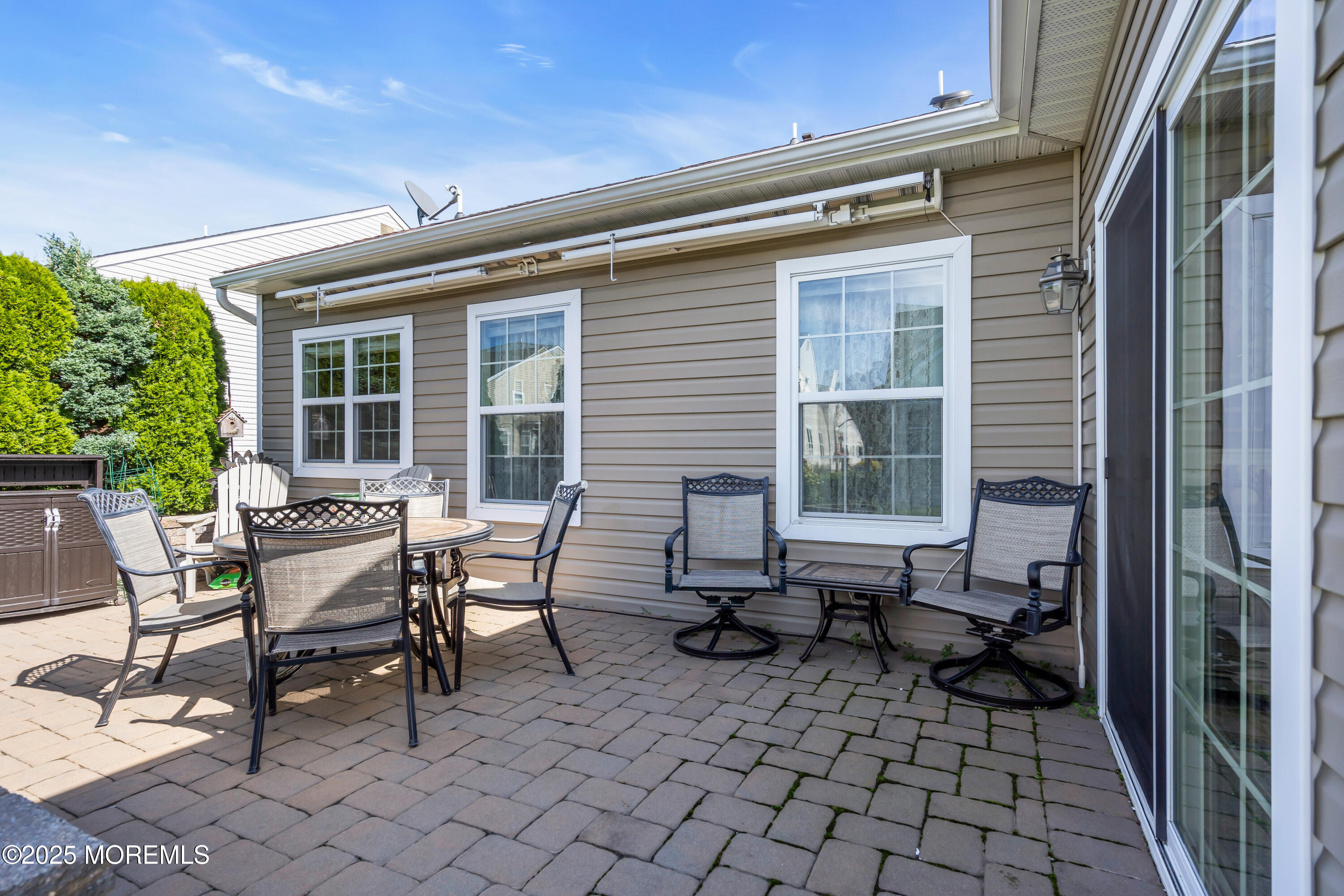 8 Ventnor Court Waretown, NJ 08758 - Photo 36 of 42 a backyard of a house with outdoor seating