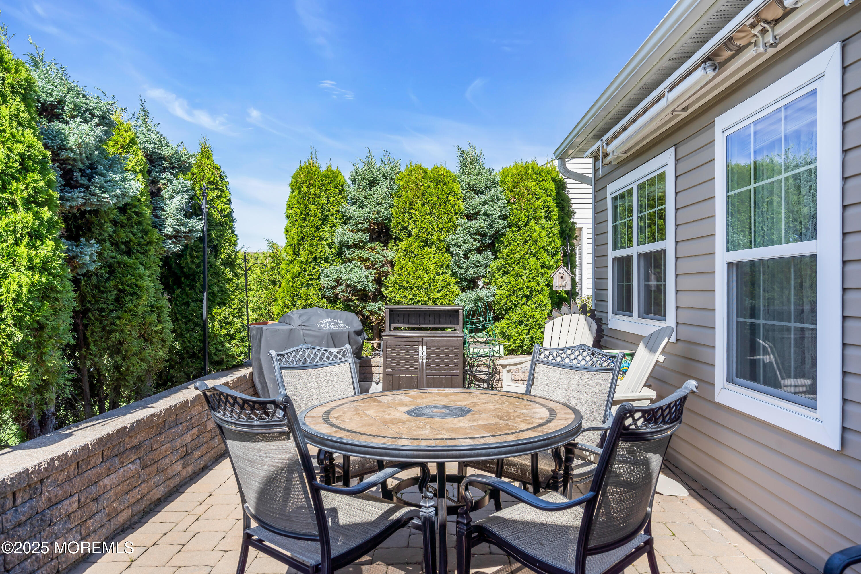 8 Ventnor Court Waretown, NJ 08758 - Photo 38 of 42 a view of a table and chairs in the balcony