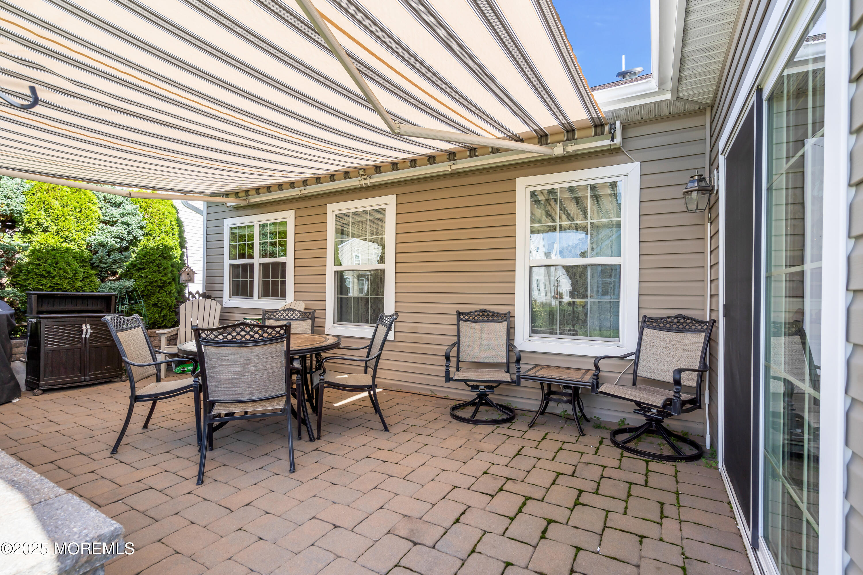 8 Ventnor Court Waretown, NJ 08758 - Photo 39 of 42 a building outdoor space with patio furniture and potted plants