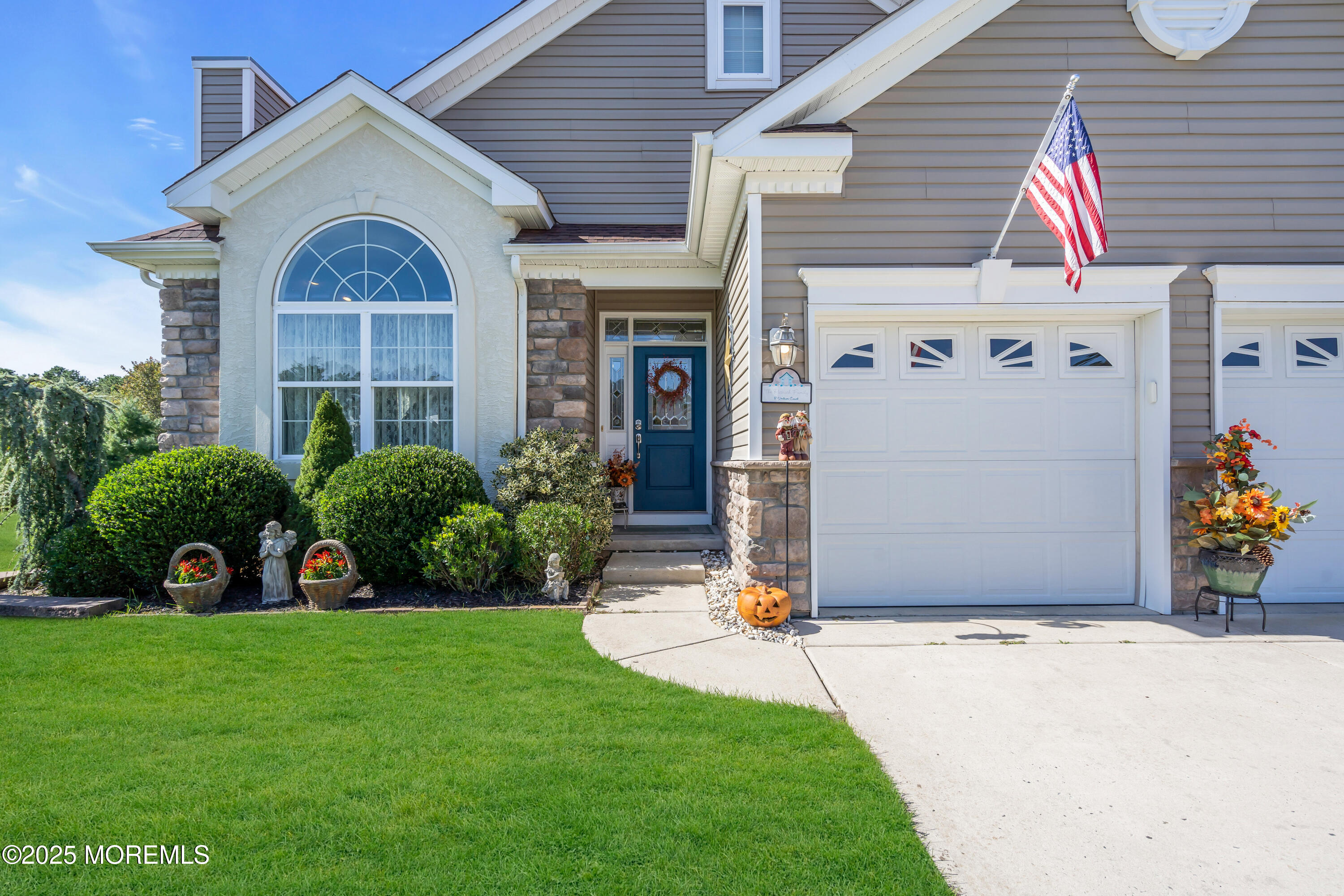 8 Ventnor Court Waretown, NJ 08758 - Photo 4 of 42 a front view of a house with garden
