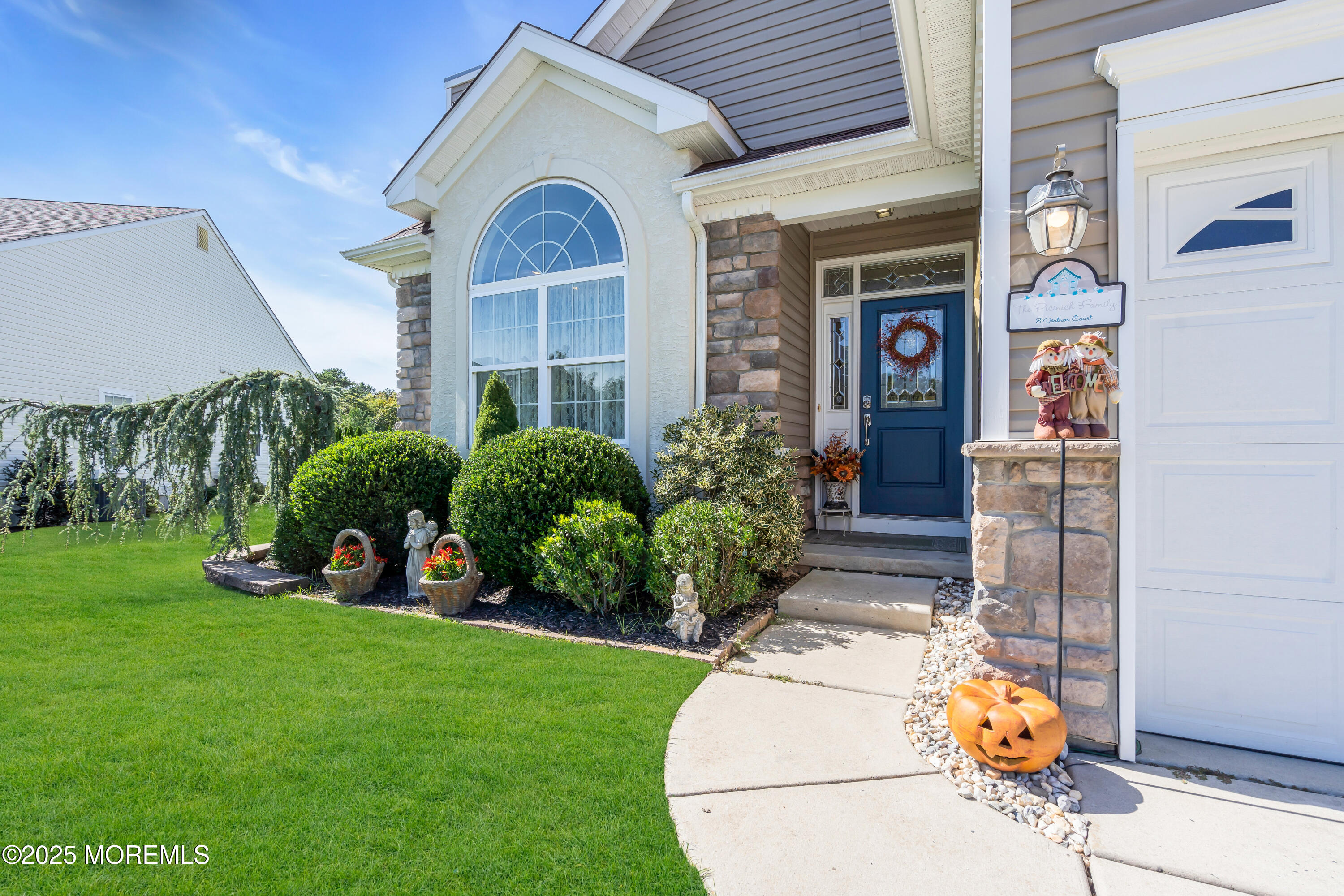 8 Ventnor Court Waretown, NJ 08758 - Photo 5 of 42 a front view of a house with garden