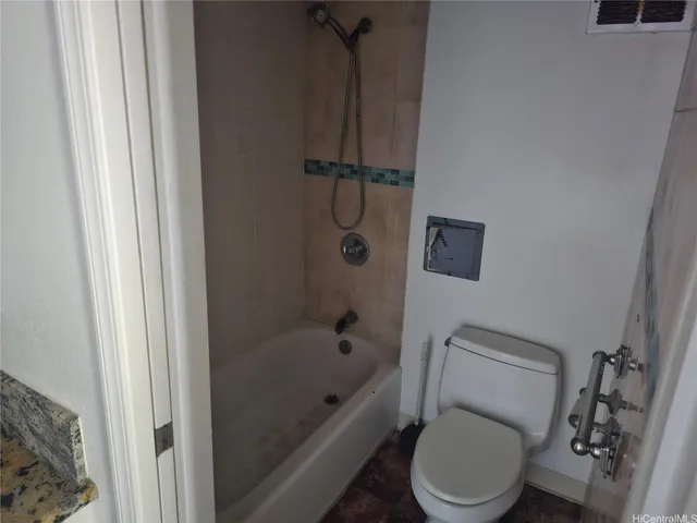 a view of a room with a walk in closet