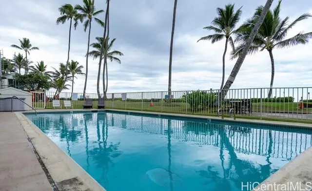 a view of a house with a swimming pool