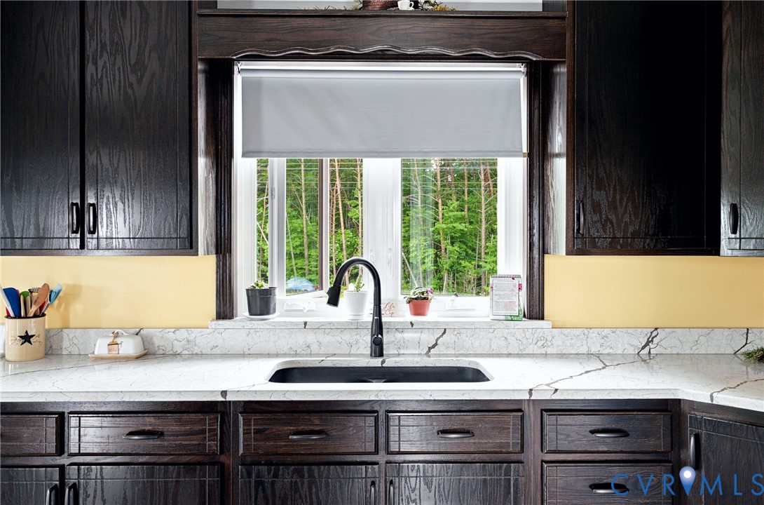 1451 Dixie Hill Road Dillwyn, VA 23936 - Photo 4 of 51 Kitchen featuring dark wood-finish cabinetry with