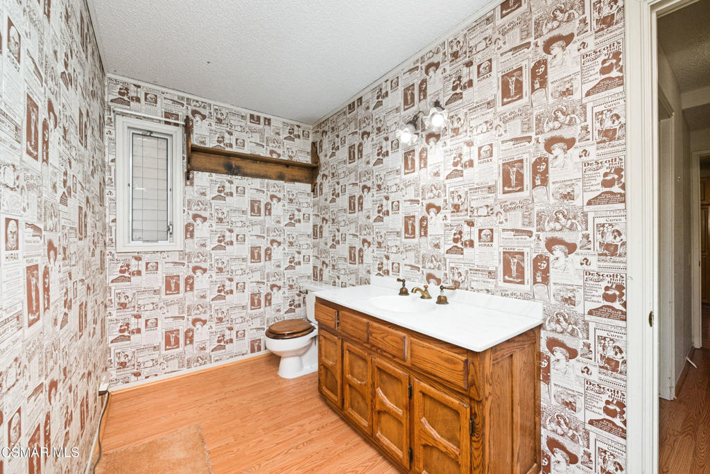 39 Inverness Road Thousand Oaks, CA 91361 - Photo 28 of 69 a bathroom with a sink and a mirror
