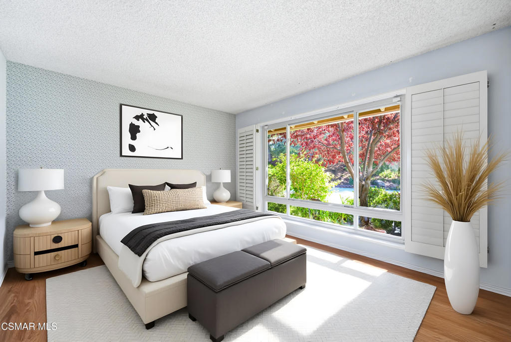 39 Inverness Road Thousand Oaks, CA 91361 - Photo 41 of 69 a bedroom with a bed and a large window