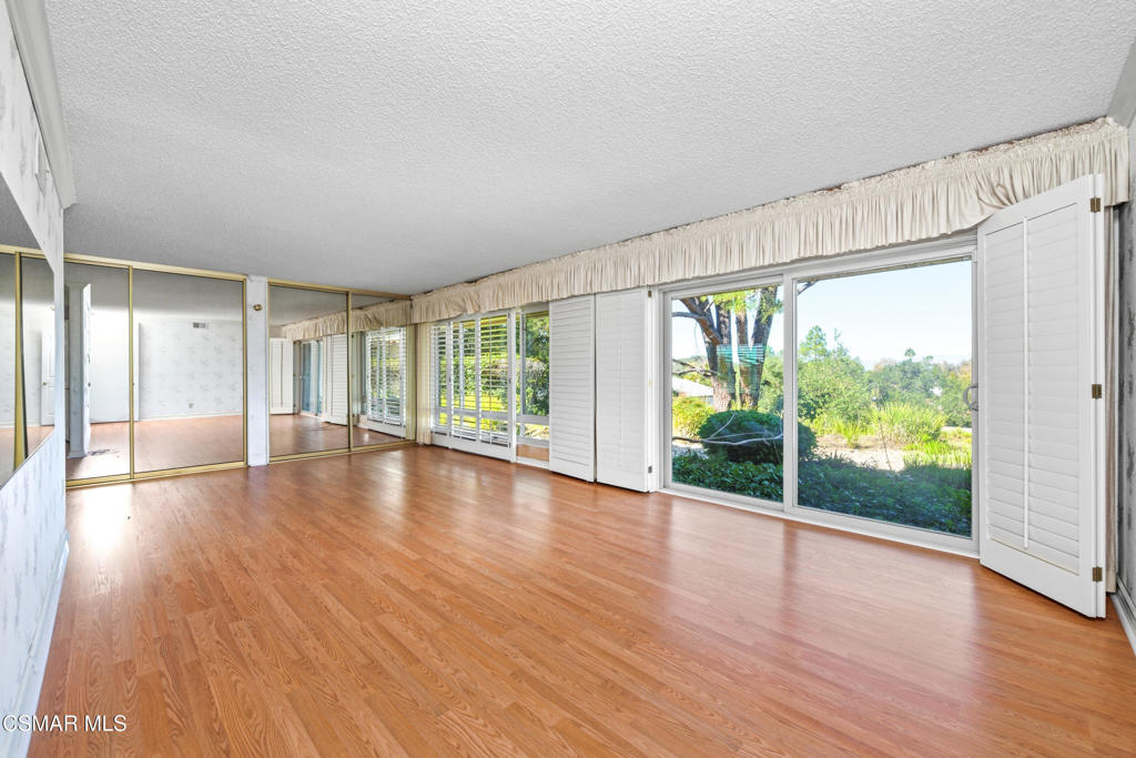 39 Inverness Road Thousand Oaks, CA 91361 - Photo 44 of 69 a view of empty room with wooden floor and fan