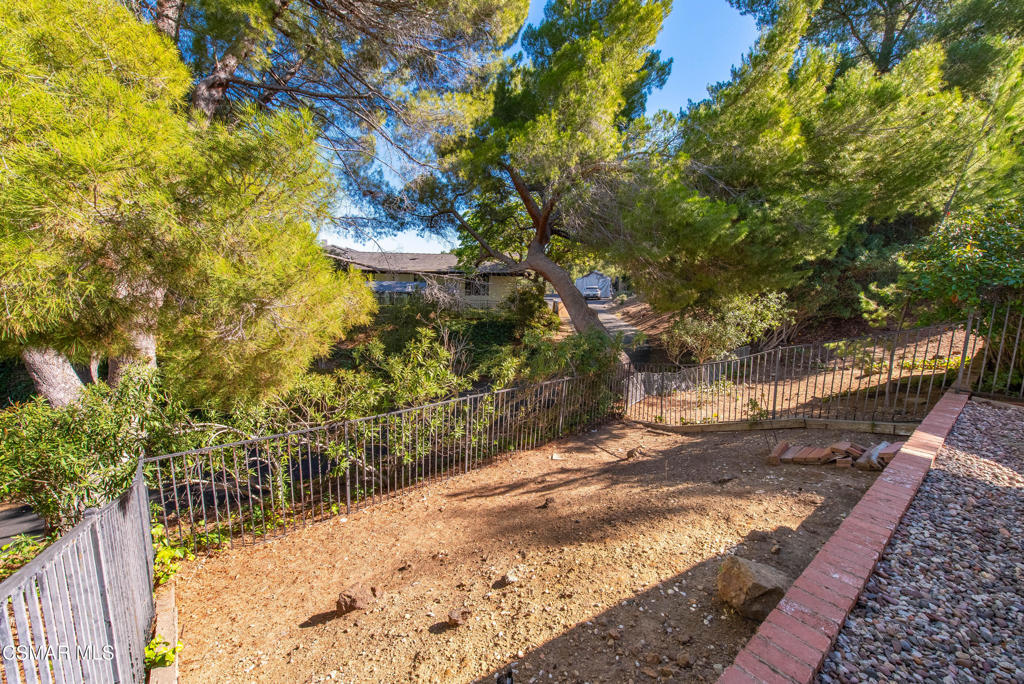 39 Inverness Road Thousand Oaks, CA 91361 - Photo 61 of 69 a view of a yard with plants and large trees