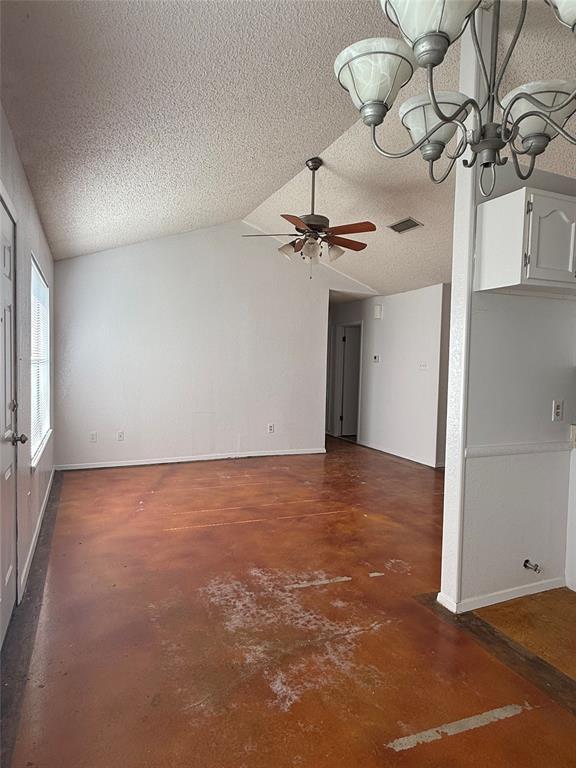 3757 Trinity Lane Abilene, TX 79602 - Photo 11 of 40 a view of a room with a chandelier fan and wooden floor