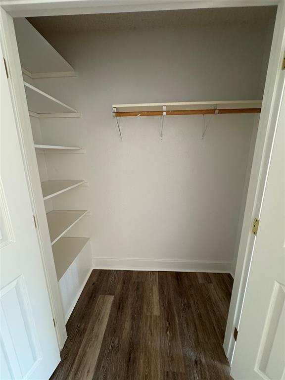 3757 Trinity Lane Abilene, TX 79602 - Photo 31 of 40 a view of walk in closet with empty racks
