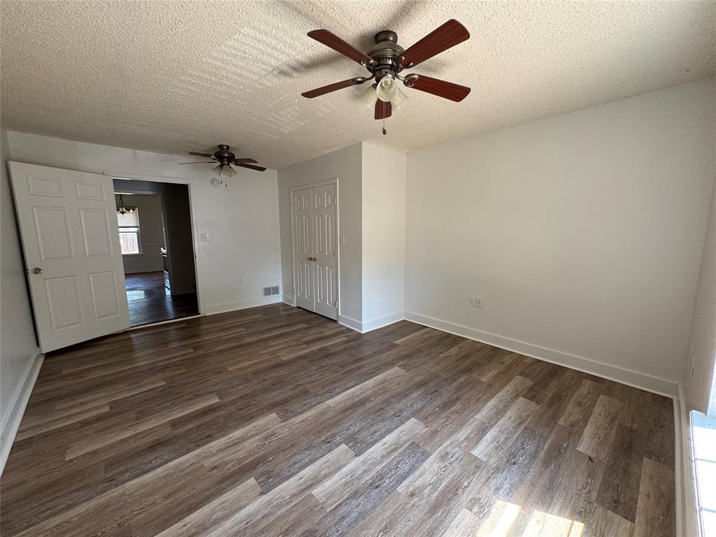 3757 Trinity Lane Abilene, TX 79602 - Photo 32 of 40 a view of empty room with wooden floor