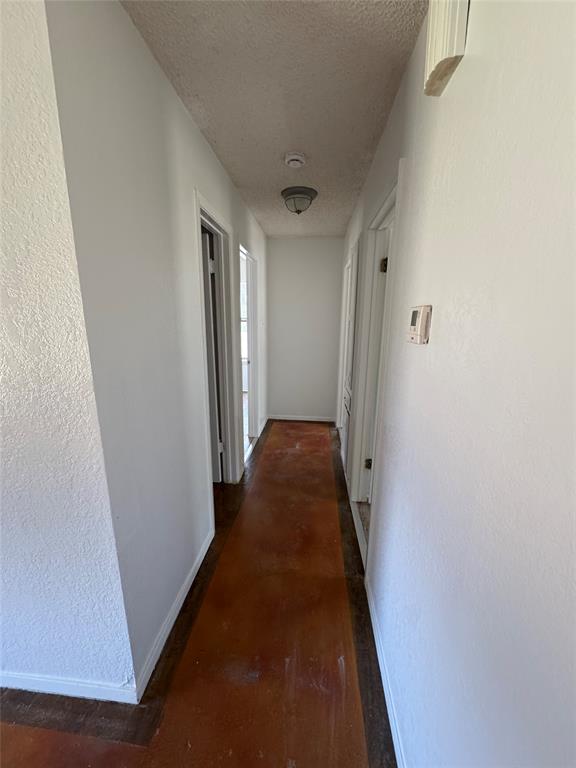 3757 Trinity Lane Abilene, TX 79602 - Photo 33 of 40 a view of a hallway to a bedroom